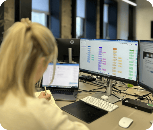Girl sits at a desk working