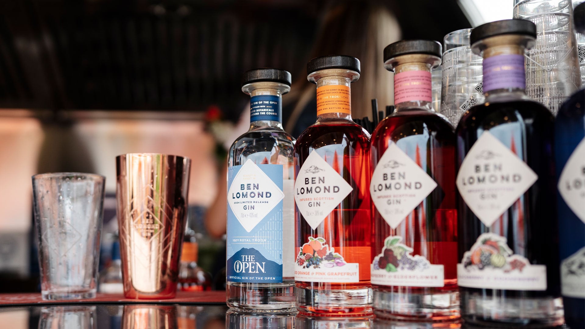 Various flavours of Ben Lomond gin displayed on a table